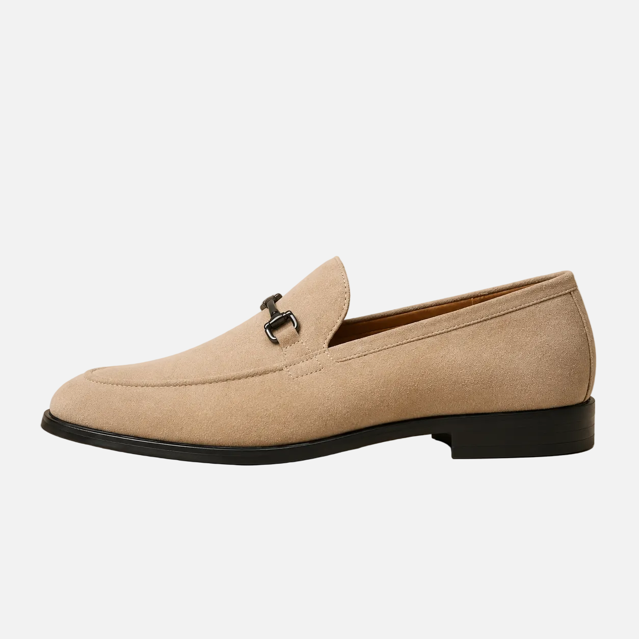 Beige loafer shoe on a beige background