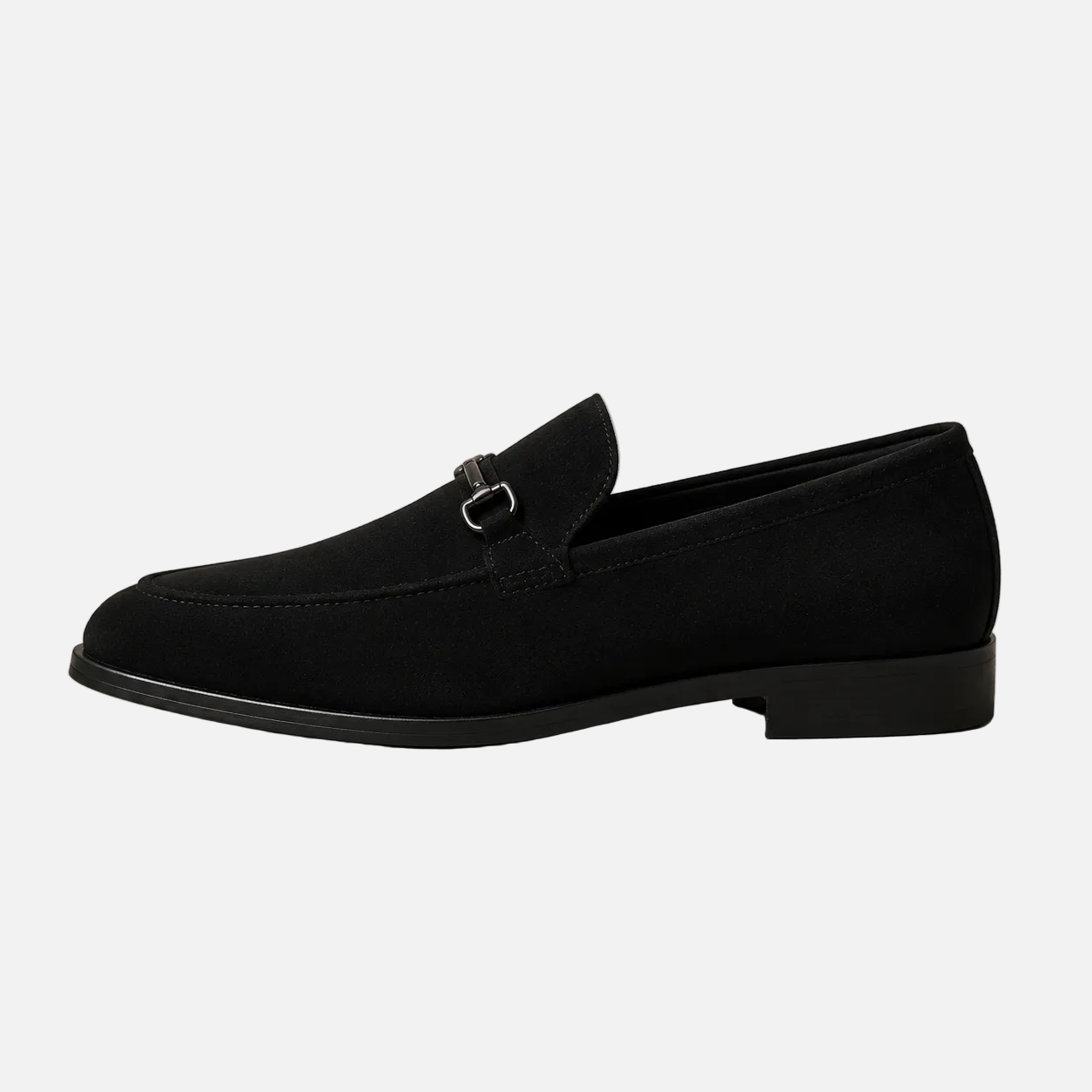 Black slip-on shoe with gray sole on a light gray background