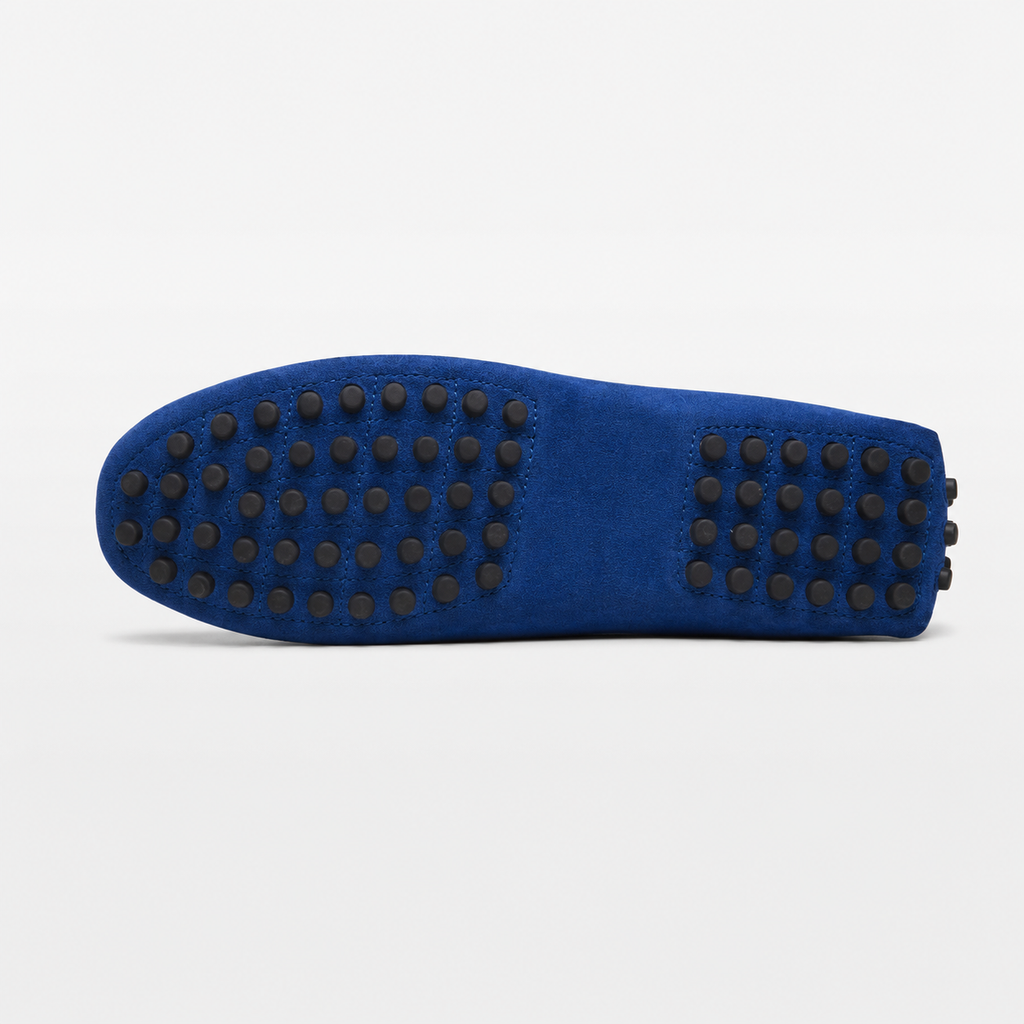 Blue shoe sole with black textured pattern on a white background