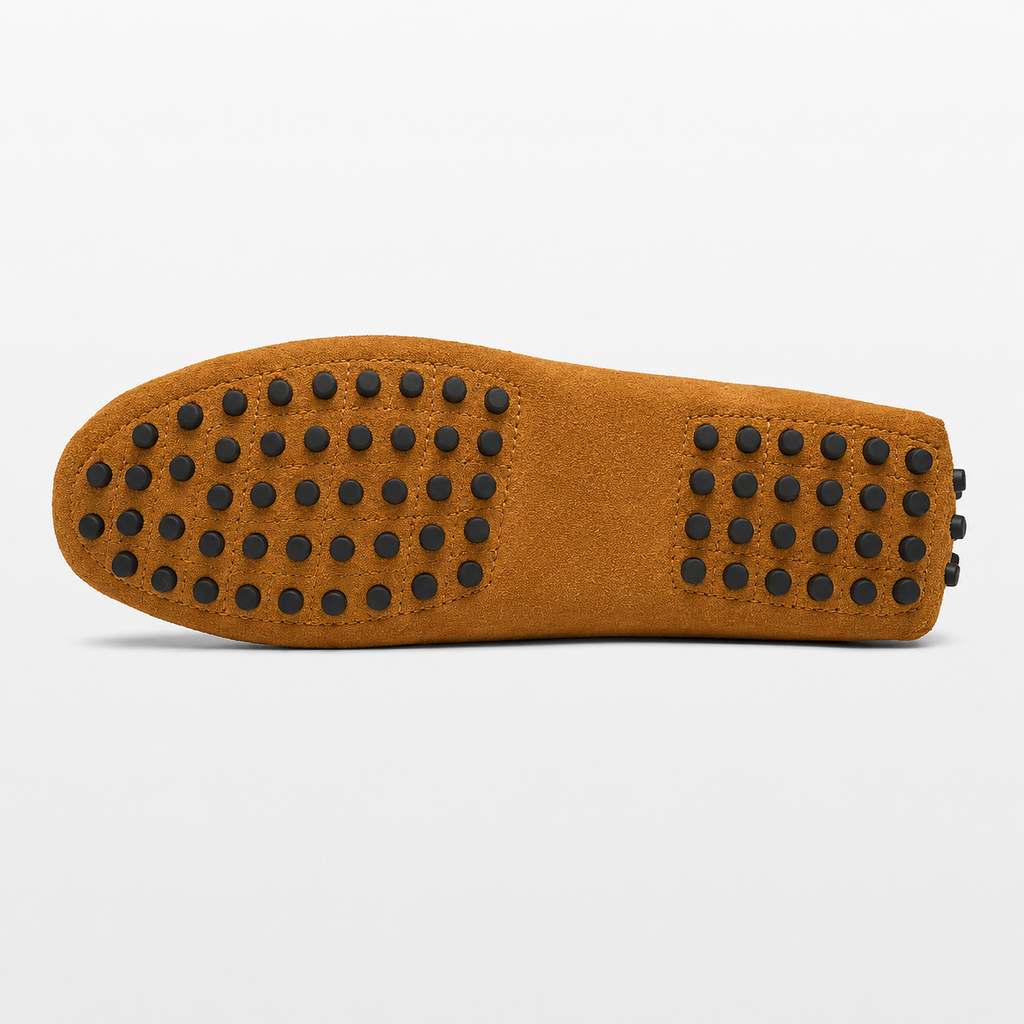 Brown shoe sole with black textured pattern on a white background