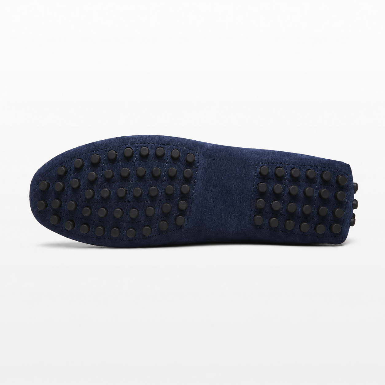 Navy blue shoe sole with textured sole pattern on a white background