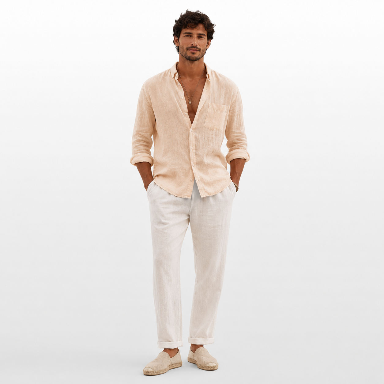 Man wearing a beige linen shirt and pants on a white background