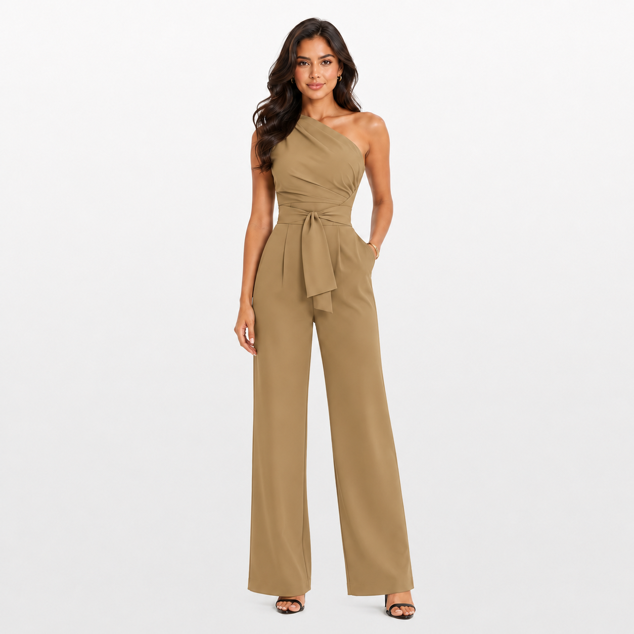 Woman wearing a beige one-shoulder jumpsuit on a white background