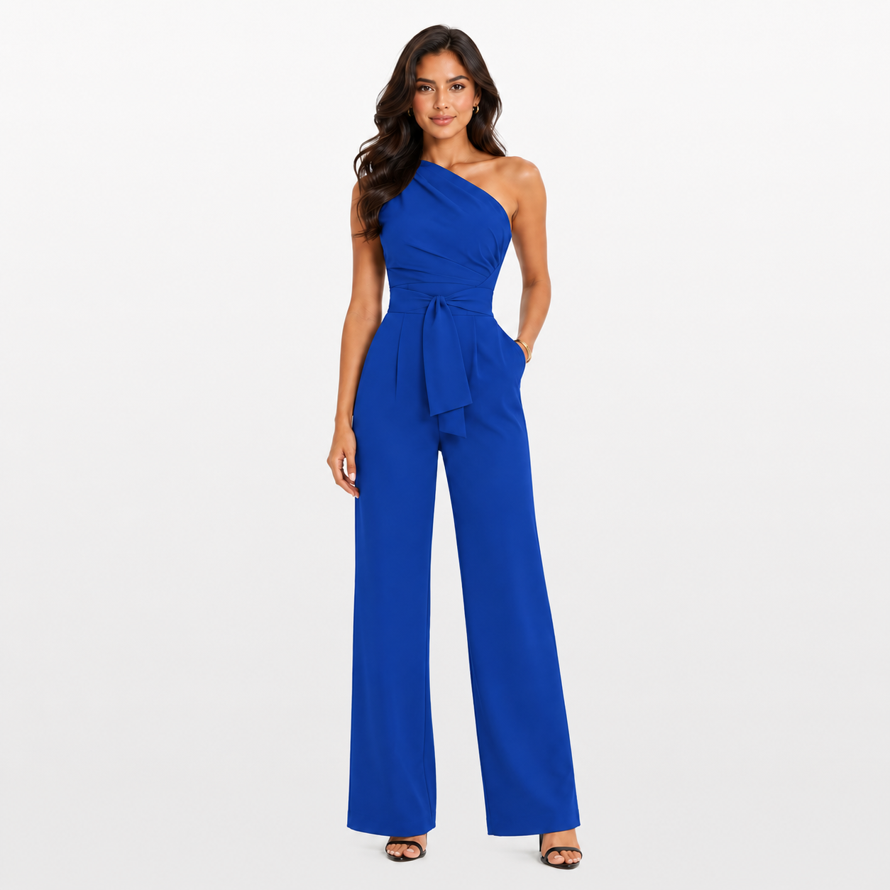 Woman wearing a blue one-shoulder jumpsuit on a white background