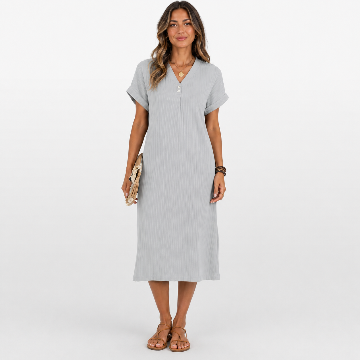 Woman wearing a gray dress on a white background