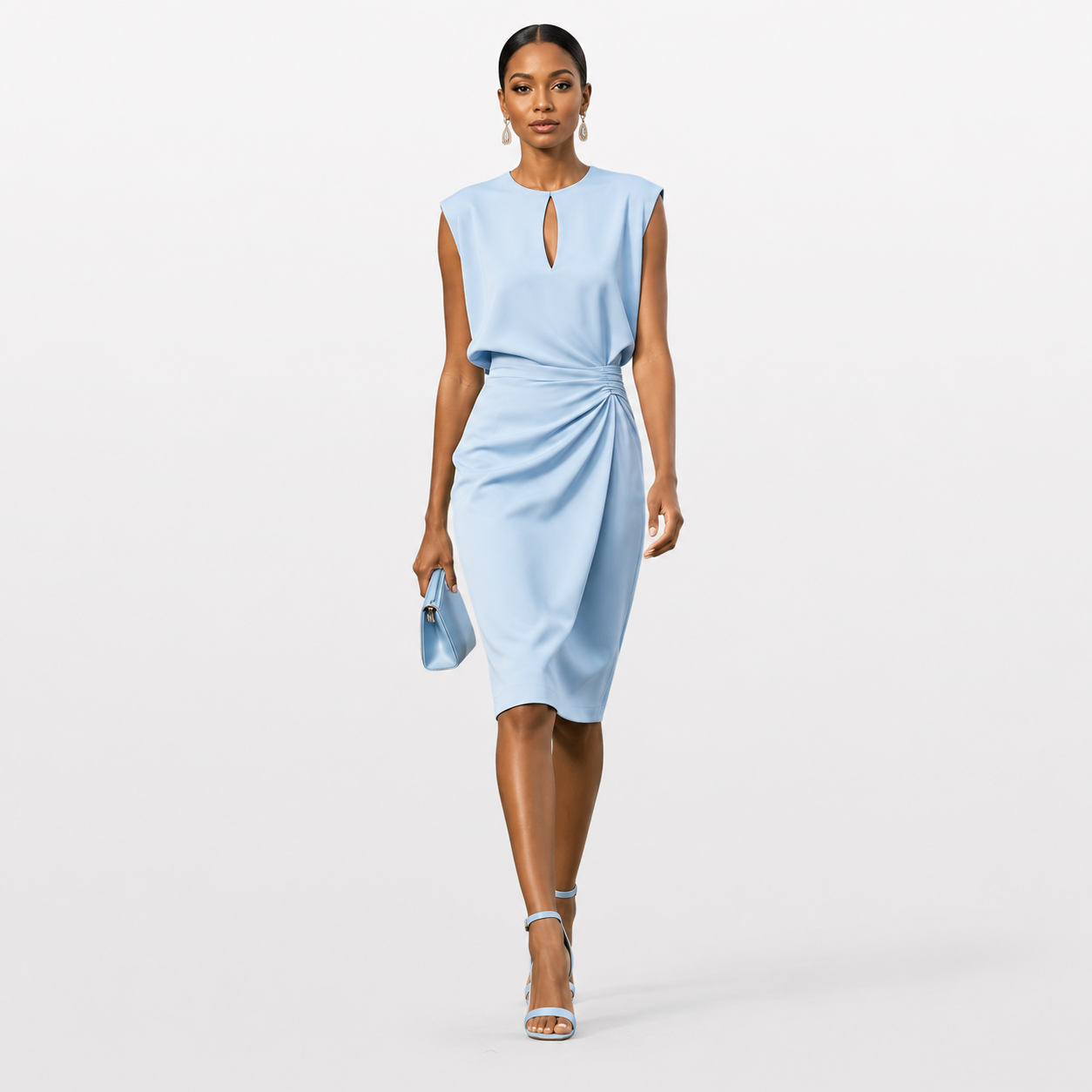 Woman wearing a light blue dress on a white background