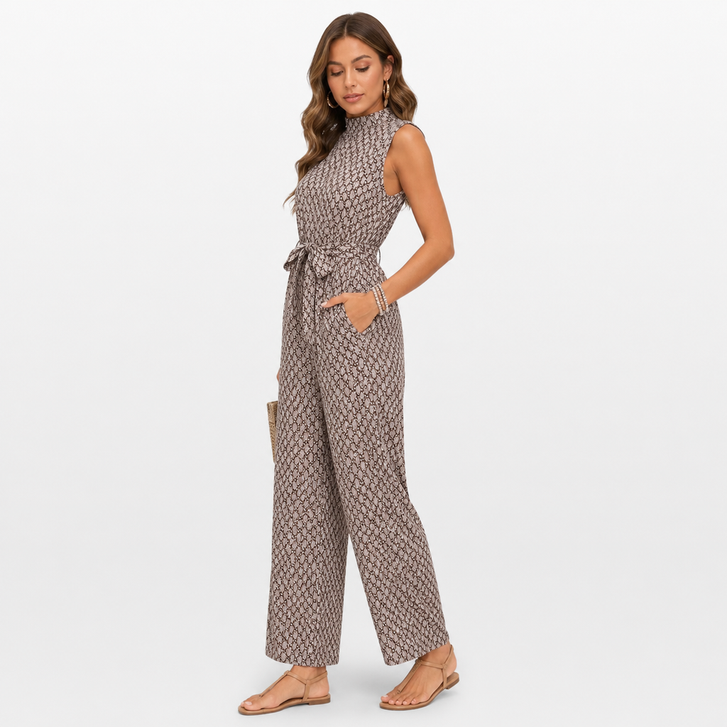 Woman wearing a patterned jumpsuit on a white background