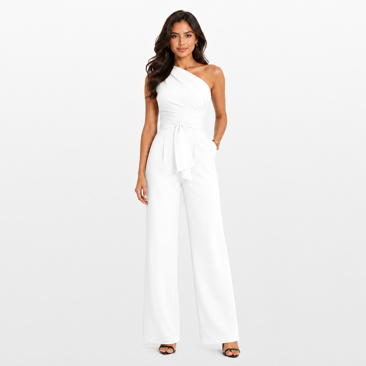 Woman wearing a white one-shoulder jumpsuit on a white background