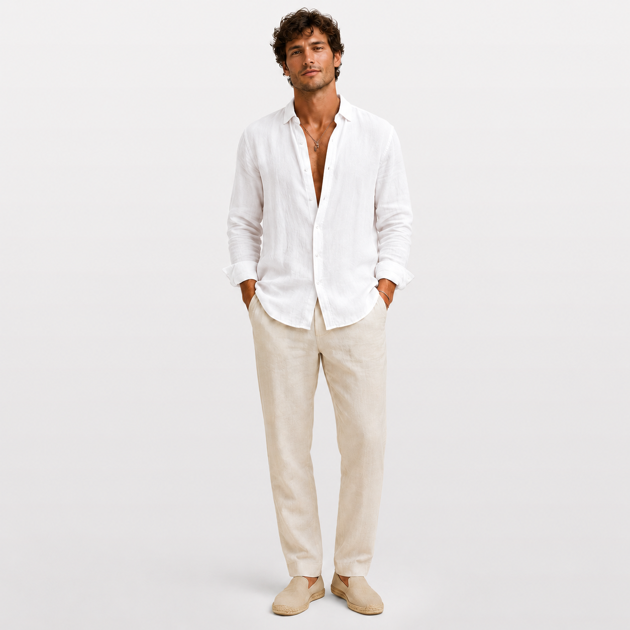 Man wearing a white shirt and beige pants on a light gray background