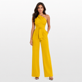 Woman wearing a yellow one-shoulder jumpsuit on a white background