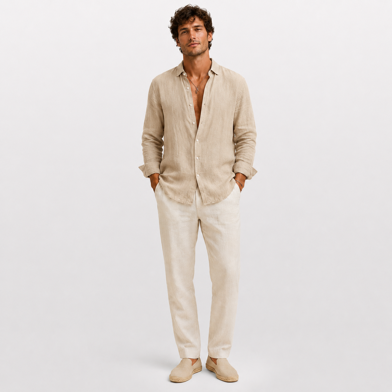 Man wearing a beige linen shirt and pants on a white background