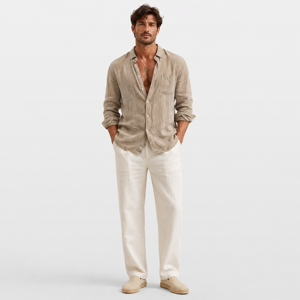 Man wearing a beige linen shirt and white pants on a light gray background