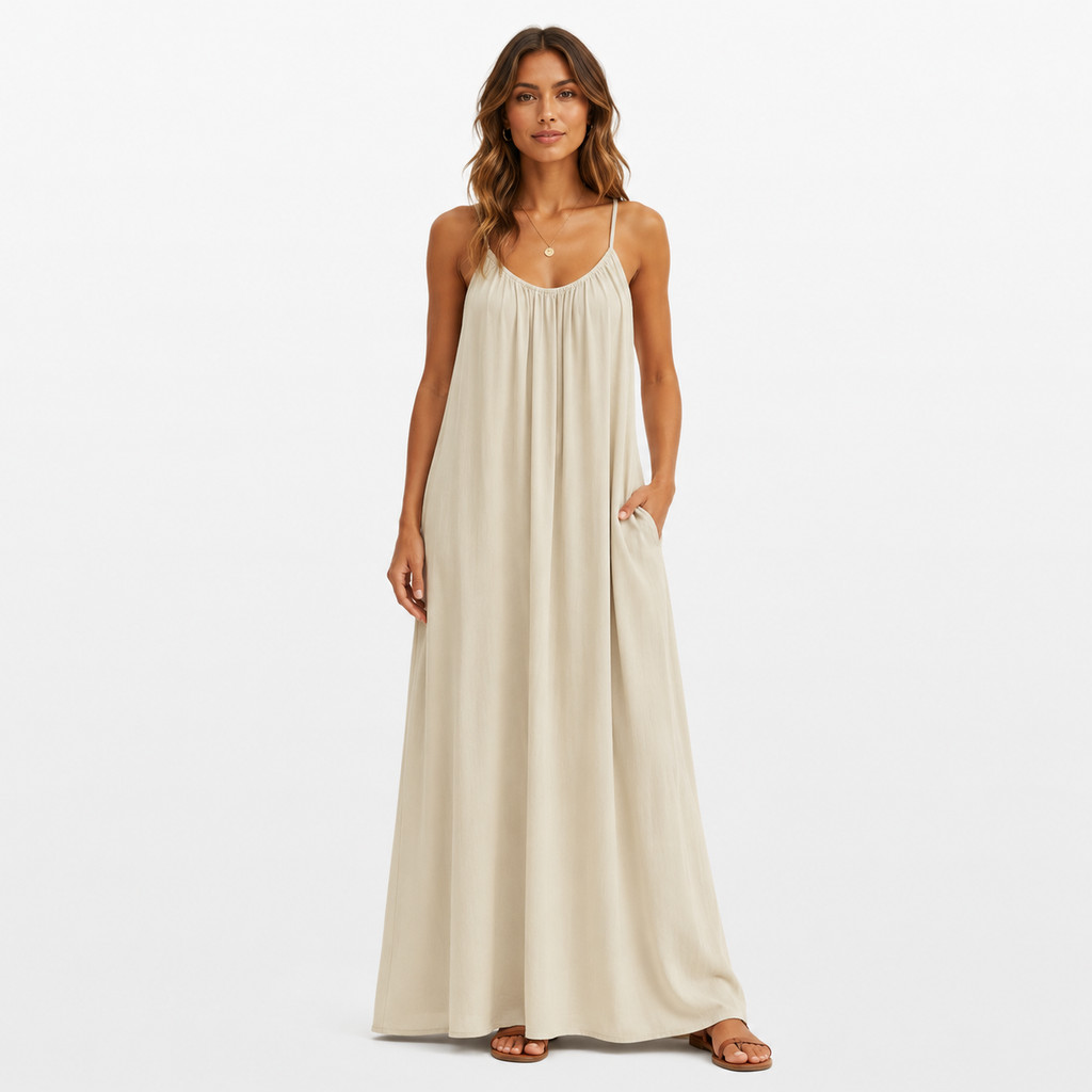 Woman wearing a beige maxi dress on a white background