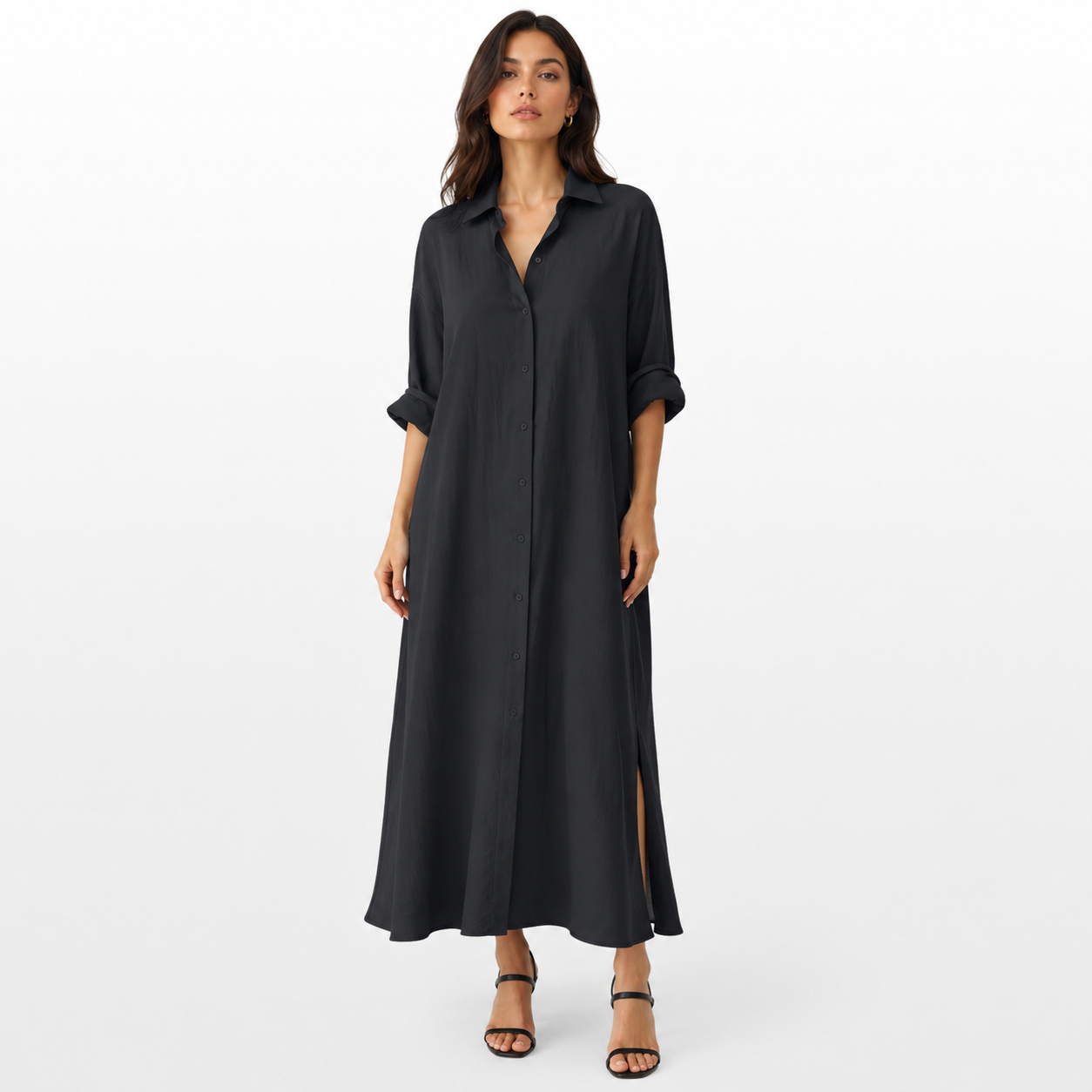 Woman wearing a black dress on a white background