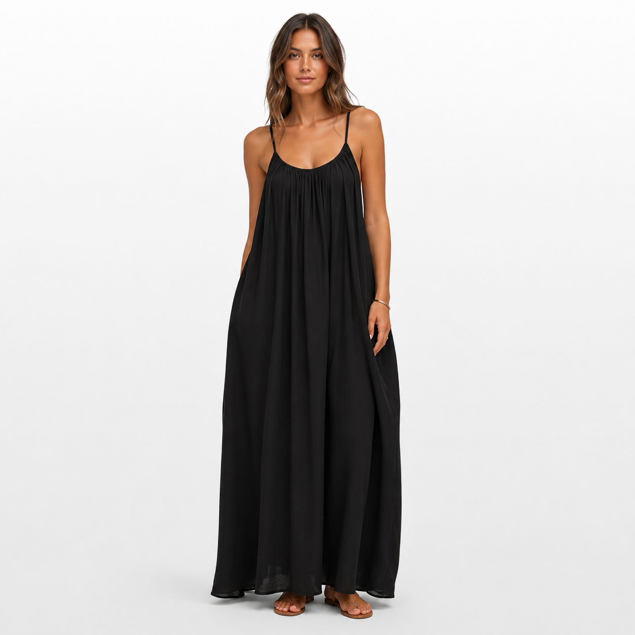 Woman wearing a black dress on a white background