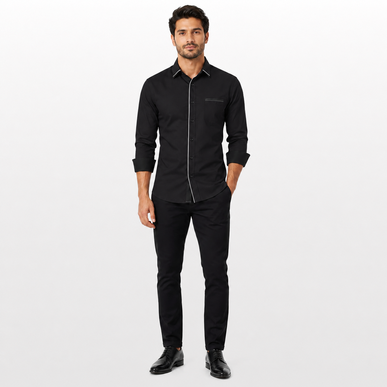 Man wearing a black shirt and pants on a white background