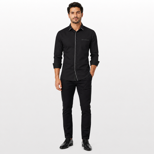Man wearing a black shirt and pants on a white background