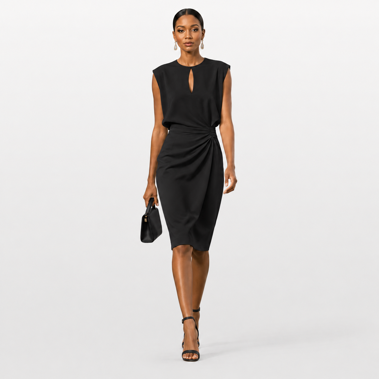 Woman wearing a black dress on a white background
