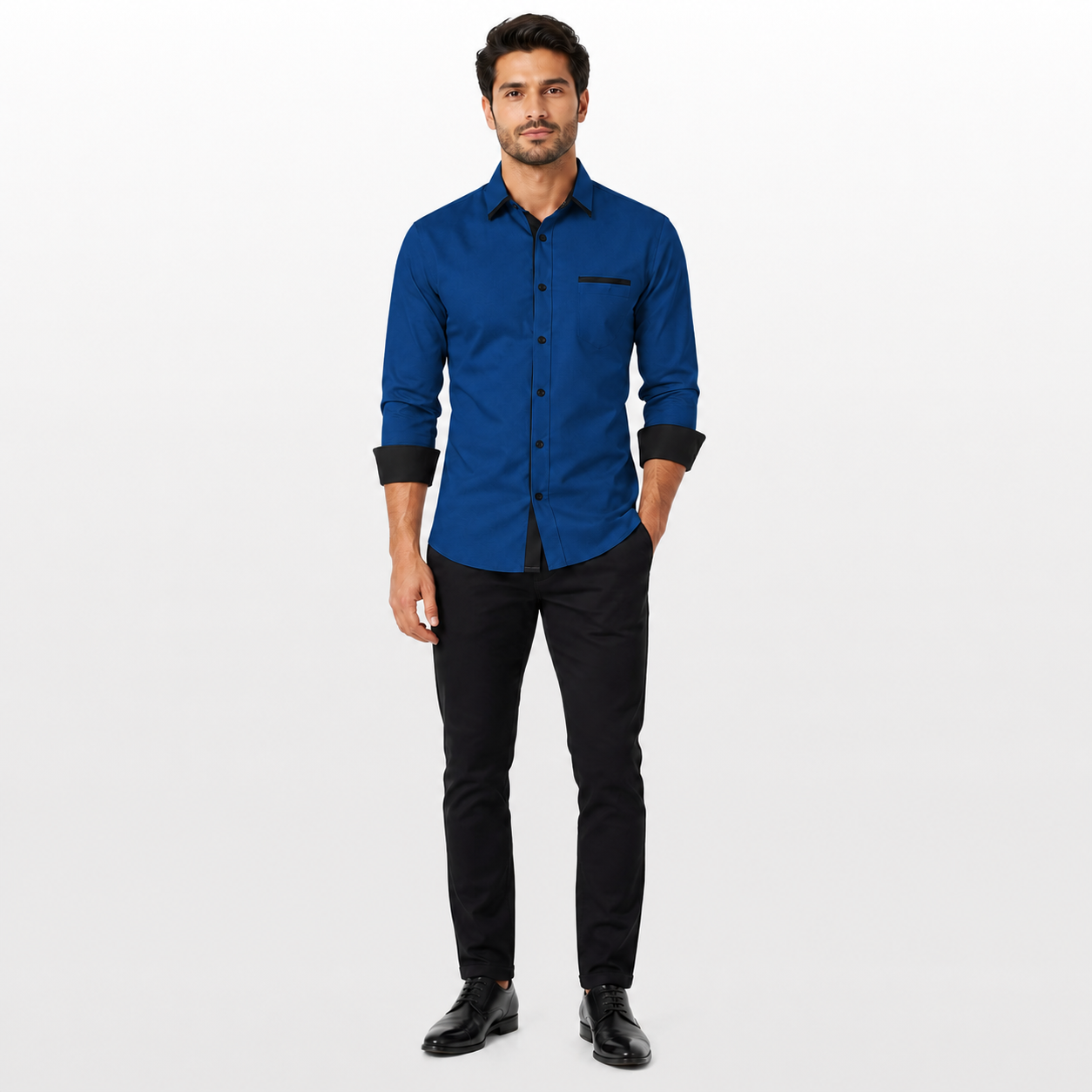 Man wearing a blue shirt and black pants on a white background