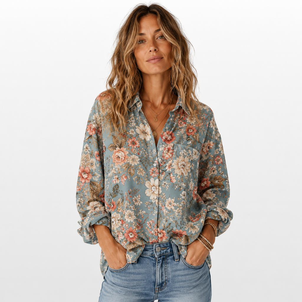 Woman wearing a floral shirt and jeans on a white background