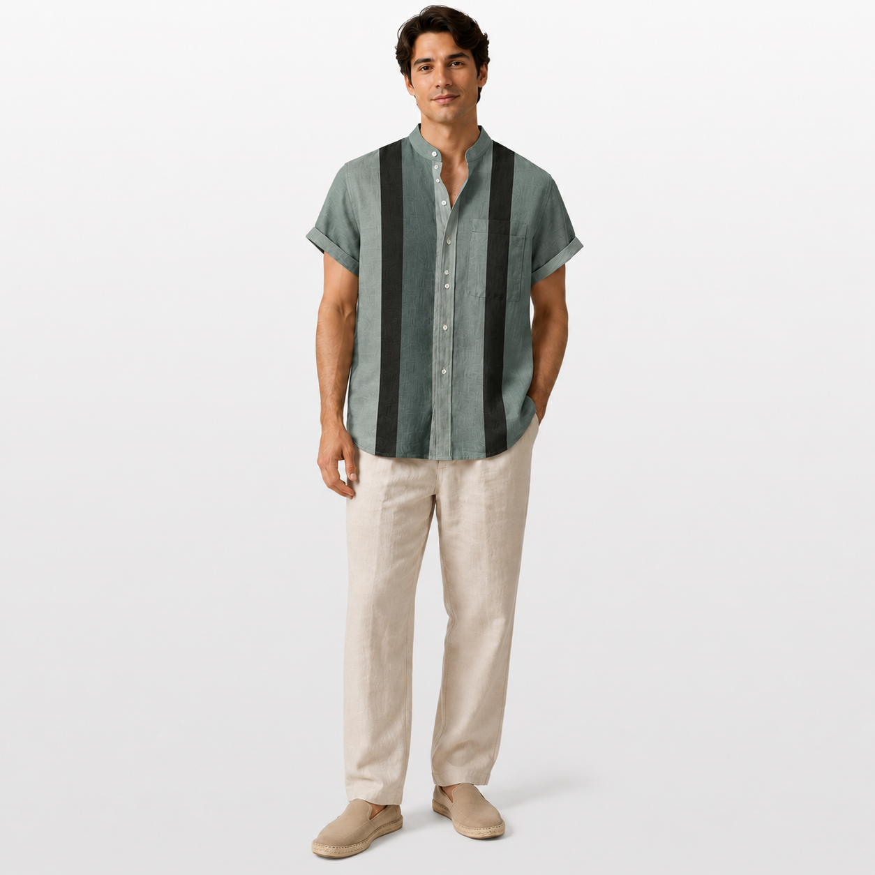 Man wearing a striped shirt and beige pants on a white background