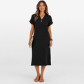 Woman wearing a black dress on a white background