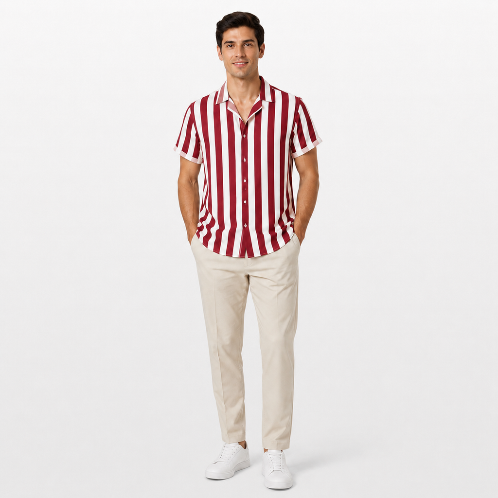 Man wearing a red and white striped shirt with beige pants on a white background