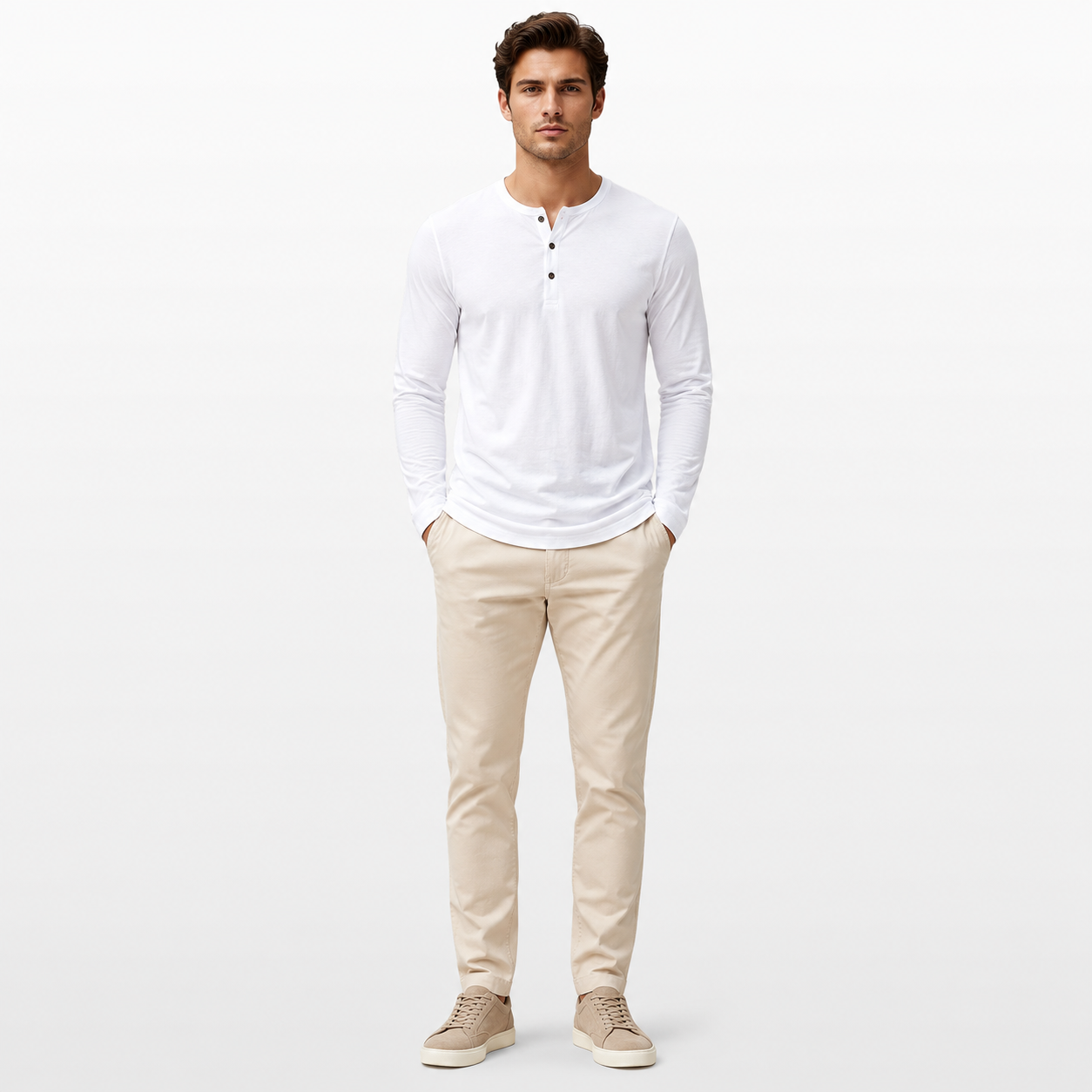 Man wearing a white long-sleeve shirt and beige pants on a white background